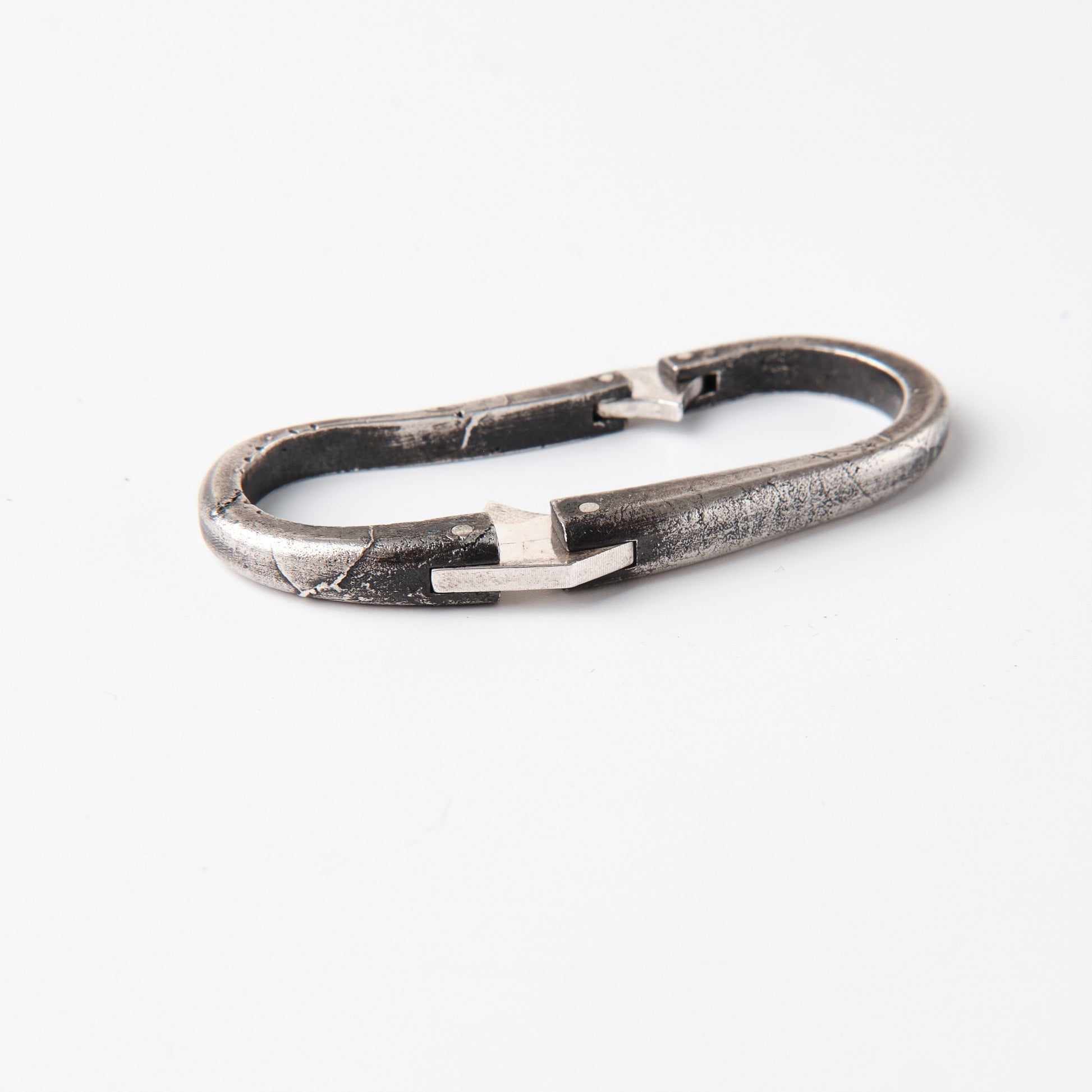 CULT VII Triple ring — bague trois doigts en argent avec patine