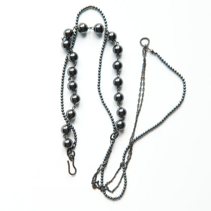 Necklace 323T – sterling silver knots between beads